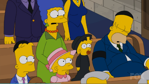 Homer naps during the funeral service