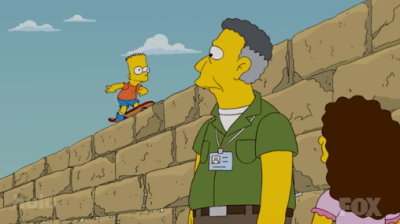 Bart riding
                    skateboard on top of Kotel