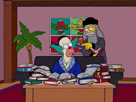 After his Rabbi-father instructs him, Krusty eats some pig sandwich